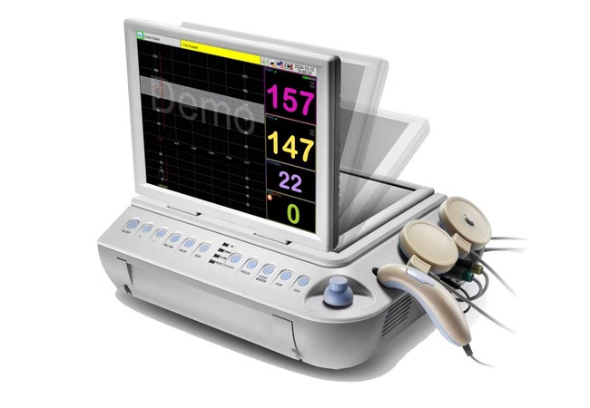 Angled CTG monitor reference with probes and demonstration screen